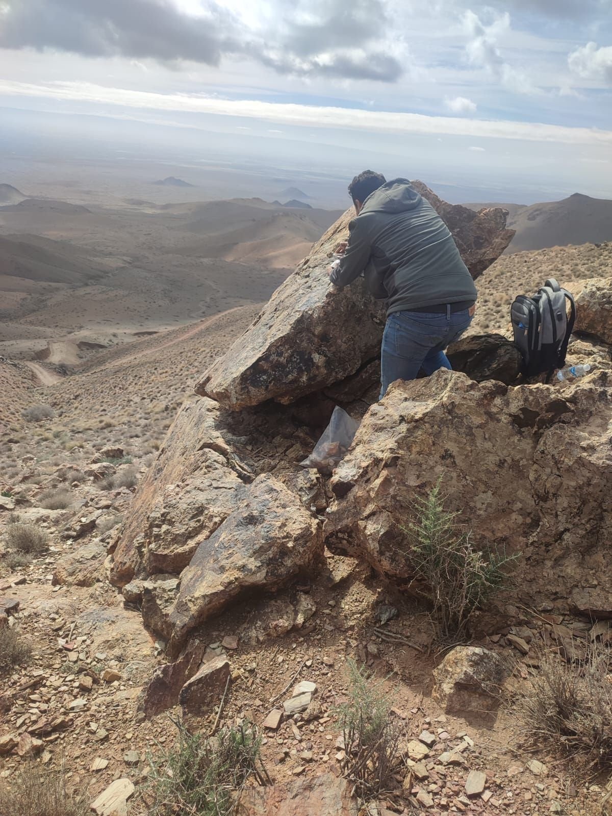 Geologist examining an outcrop in Morocco